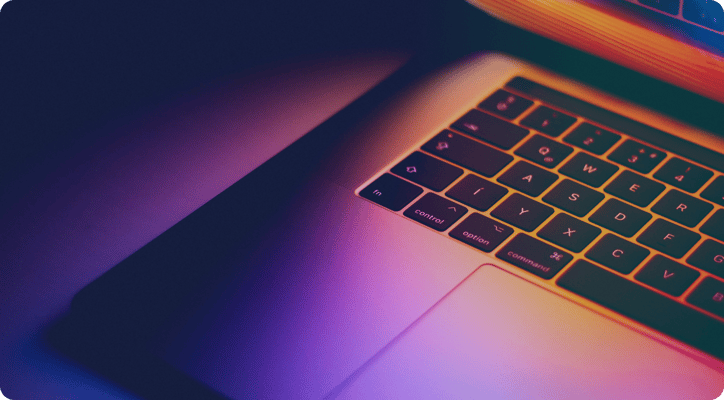 apple laptop with gradient light