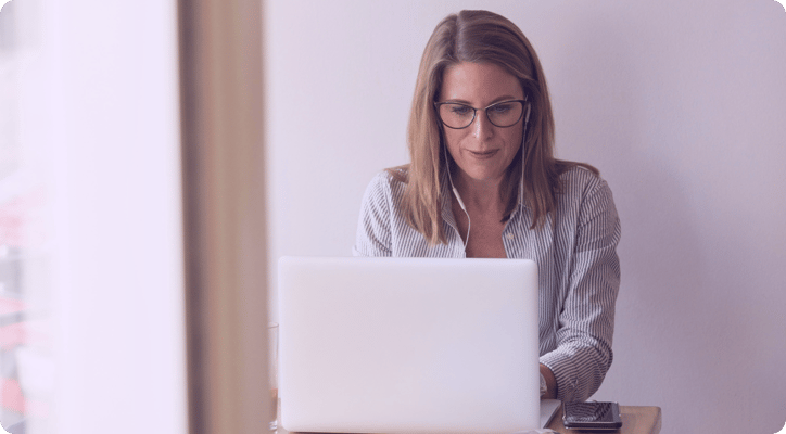 woman sitting at laptop working