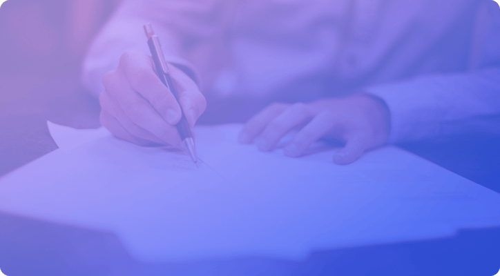 Writing with pen on paper